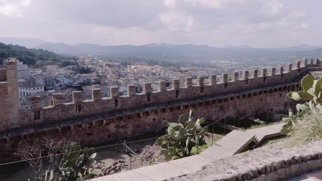 A huge old stone fences of the Castle of Capdepera, Spain