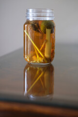 A glass of traditional tea with lemongrass and lime