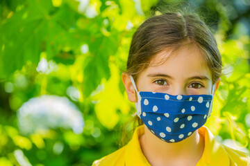 Little girl with mask