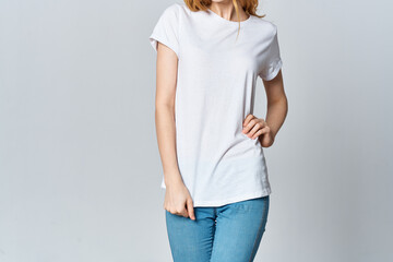 woman in white t-shirt posing fashion design advertisement