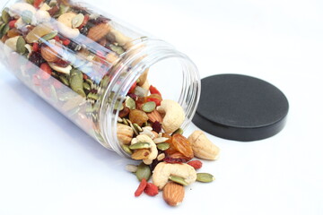 The healthy snack with ailmonds, nuts, dried grapes, pumkin seed and more of dried fruits. Focus in the middle and blurred around