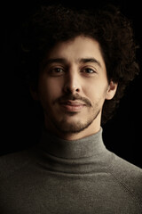 Obraz premium man with curly dark hair