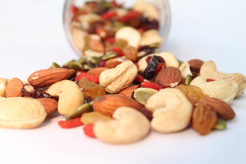 The healthy snack with ailmonds, nuts, dried grapes, pumkin seed and more of dried fruits. Focus in the middle and blurred around