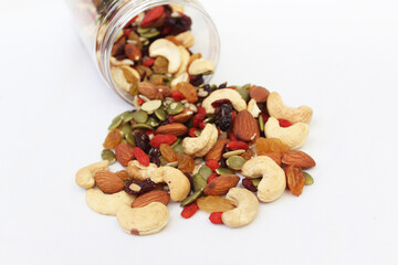 The healthy snack with ailmonds, nuts, dried grapes, pumkin seed and more of dried fruits. Focus in the middle and blurred around