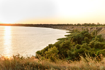 Picturesque slope of the sea coast on a warm summer day