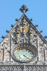 Wall figure of the knight at main facade and clock side of the catholic cathedral in Magdeburg, Germany, closeup