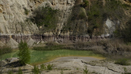 A lake formed in the relief of the abandoned clay career
