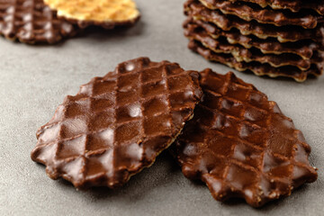 Crispy waffle snack coated in sweet chocolate