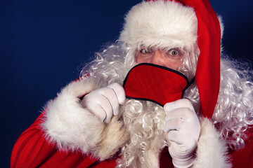 Rest. Funny Santa Claus, sleep and pillows.