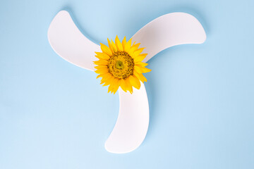 Ventilation fan with sunflower. eco green energy environmental friendly power technology data. High...