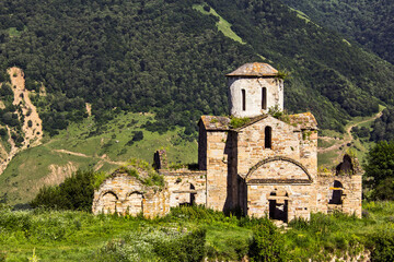 Fototapeta na wymiar An ancient temple in the mountains of the North Caucasus. Sentinsky Temple. Abandoned building