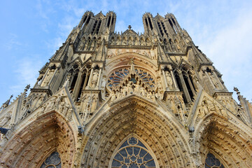 Cathedral of Reims, France, main portal figures and towers of the historical building