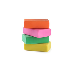 Stack of bright erasers on white background