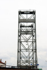 Fototapeta na wymiar Steel vertical lift bridge over Gouwe canal in Waddinxveen