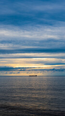 Fototapeta premium Blue sky, sunset and sea.