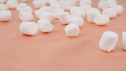 marshmallow background on a solid silk background