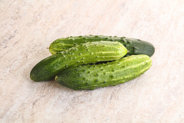 Fersh juicy green cucumbers heap