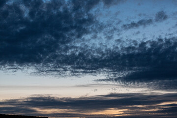 Fototapeta premium Image of colorful evening sky with light clouds