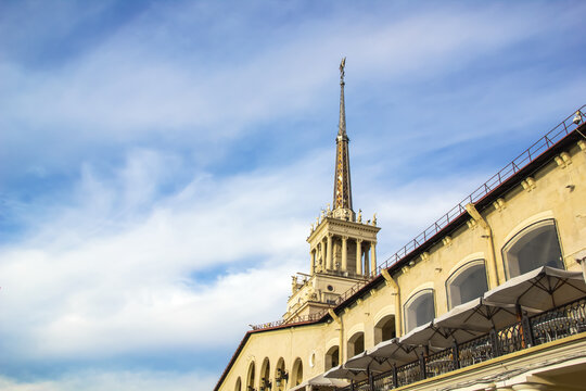 The Building Is In The Style Of The Stalin Empire. Picture Of The Station In Sochi Against The Sky. Seaport On The Black Sea, Krasnodar Territory