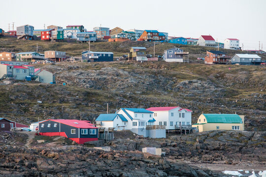Homes built on seaside cliffs, Iqaluit, Baffin Island.