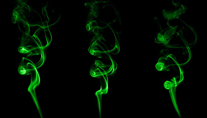 green smoke isolated black background	

