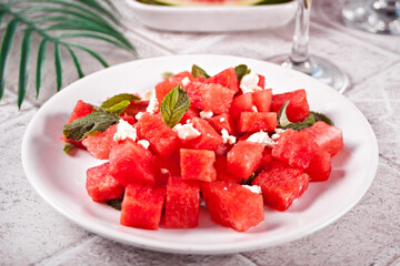 Salad with watermelon, feta cheese and mint leaf