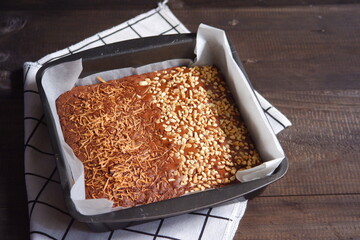 chocolate brownies with peanut and cheese topping 