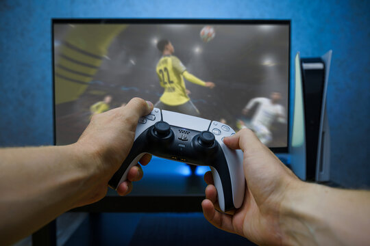 FIFA 2021 football video game on new generation Sony Playstation 5 video console. Point of view shot.