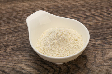 Wheat flour heap in the bowl