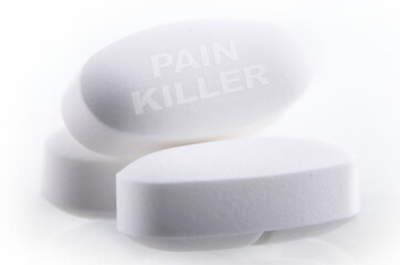 Composition with pharmaceutical drug pills over white background