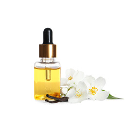 Jasmine essential oil, fresh flowers and vanilla sticks on white background