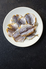 dried salted fish sun-dried or smoked snacks for beer meal snack on the table copy space food background rustic. top view