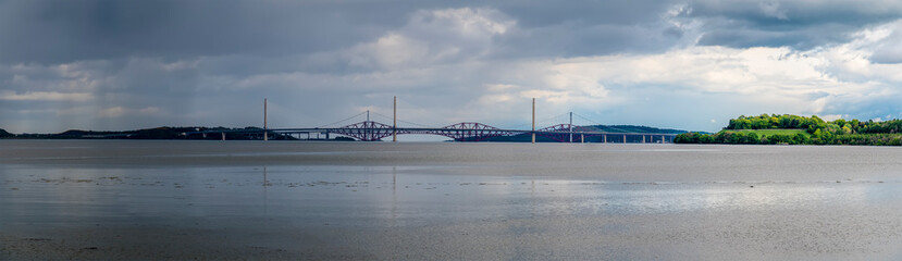 A panorma view across the Firth of Forth towards the Forth Railway bridge, Scotland on a summers day