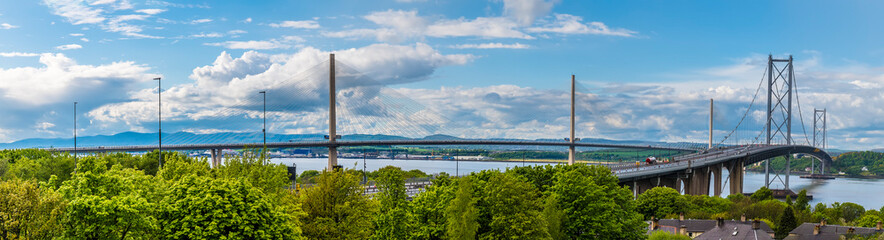 A panorama view of the road bridges over the Firth of Forth, Scotland on a summers day