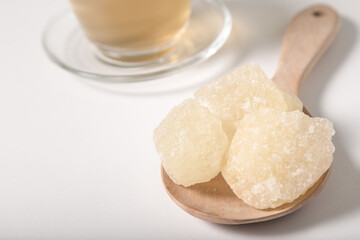 Rock sugar on white background.