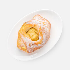 sweet fresh buns with powdered sugar on white background