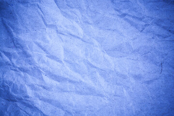Recycling blue paper crumpled background.