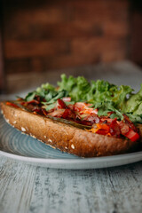 sandwich with dark bread and vegetables