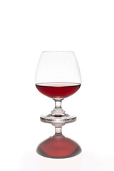 Whiskey in glass on a white background.