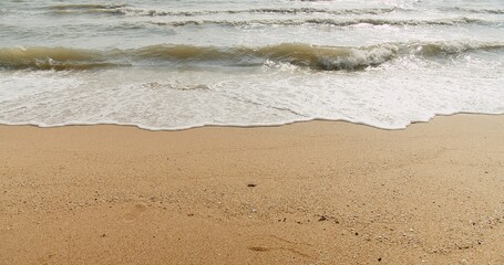 Beauty in nature seascape beach waves surf in sunny day summertime at tropical Hua Hin beach in Thailand	
