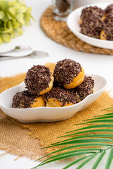 delicious homemade mini doughnut or donut. 

Donut is popular in many countries and is prepared in various forms as a sweet snack that can be homemade or purchased in bakeries, supermarkets.
