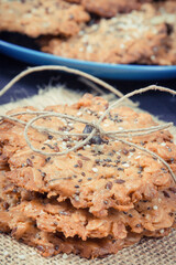 Fresh oatmeal cookies with honey and healthy seeds. Delicious crunchy dessert