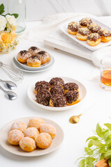 delicious homemade mini doughnut or donut. 

Donut is popular in many countries and is prepared in various forms as a sweet snack that can be homemade or purchased in bakeries, supermarkets.