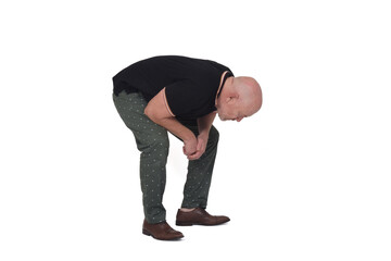 man crouching and searching the floor on white background
