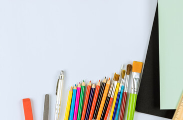 Fototapeta premium Top view on student material group art of various school supplies
