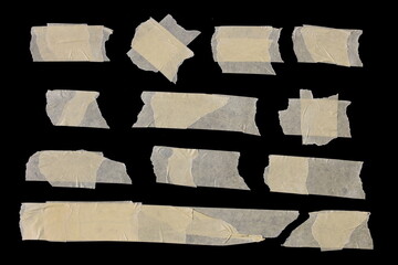 Collection of adhesive tape pieces on black background