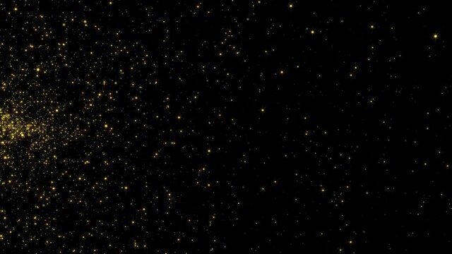 Gold particles on black background 4k footage moving slow motion