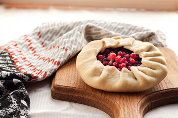 Lenten berry galette on a wooden board