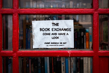 book exchange sign in old telephone box