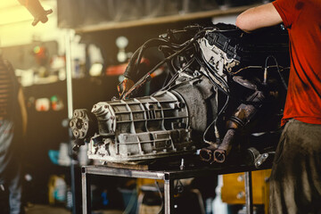 Fototapeta na wymiar car engine and gearbox repair, specialized car service concept